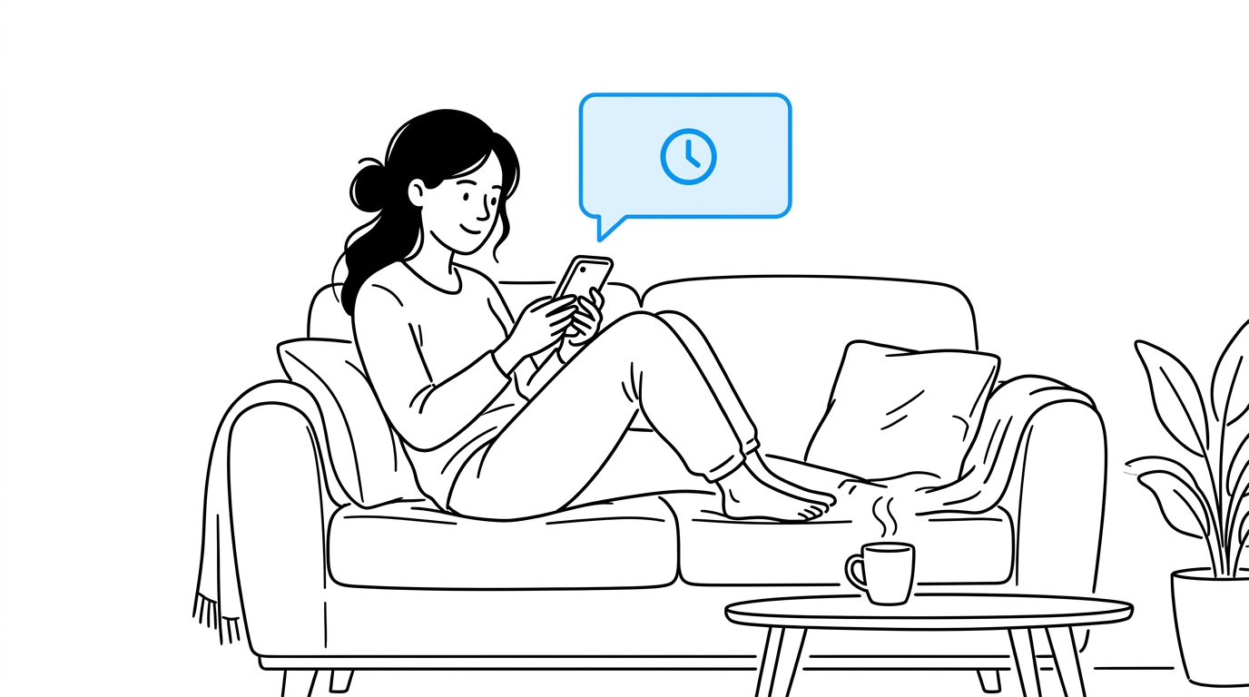 A woman relaxing on a sofa looking at her phone, which shows a floating blue text-message bubble with a small clock icon beside it